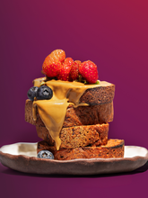 Load image into Gallery viewer, Thick slices of Bread SRSLY's Cinnamon Raisin bread topped with peanut butter drizzle and berries