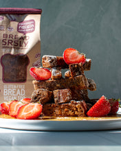 Load image into Gallery viewer, Bread SRSLY Cinnamon Raisin gluten-free sourdough cut into French toast sticks, drizzled in maple syrup and powdered sugar with sliced strawberries