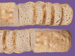 Bread SRSLY gum-free, rice-free sourdough sandwich bread loaves on a purple background.