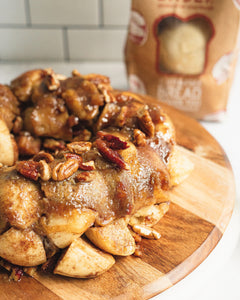 Bread SRSLY gluten-free sourdough dinner rolls cut up and made into cinnamon sugar "monkey" bread with pecans.
